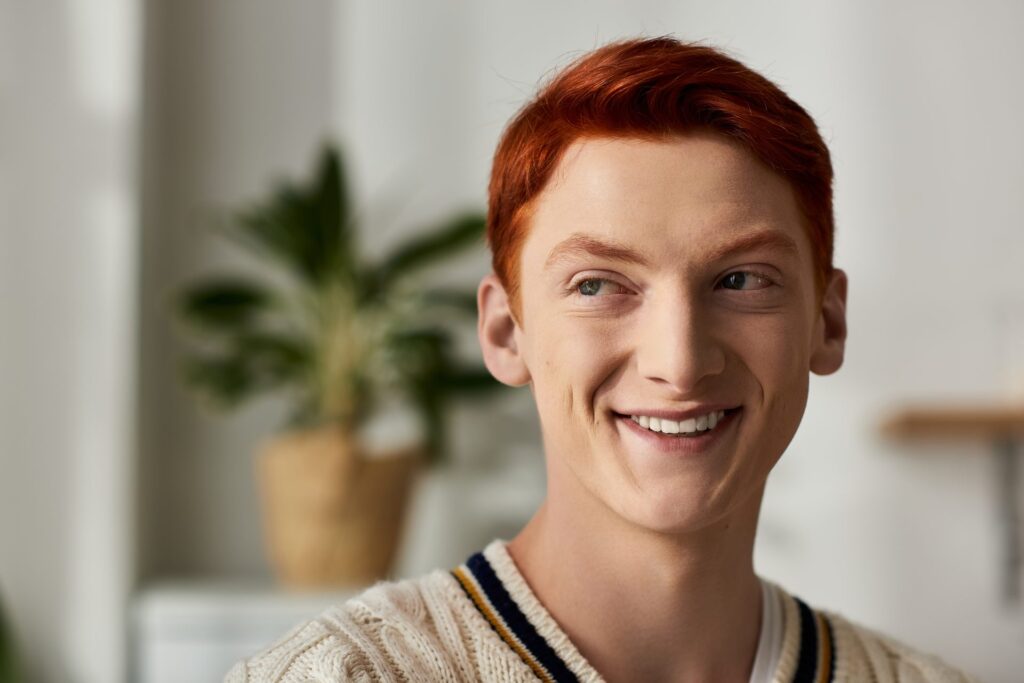 Smiling man with red hair